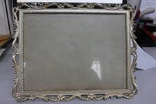 CORNICE IN METALLO ARGENTATO MIS. 27 X21 CM