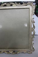 CORNICE IN METALLO ARGENTATO MIS. 27 X21 CM
